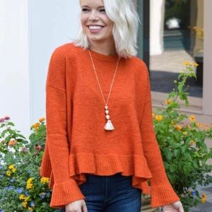 Red THML sweater size medium